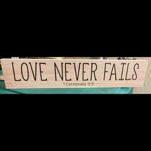 Love never fails wooden plank